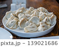 A plate of Georgian khinkali dumplings, Georgian dumplings served on a white plate 139021686