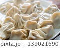 A plate of Georgian khinkali dumplings, Georgian dumplings served on a white plate 139021690