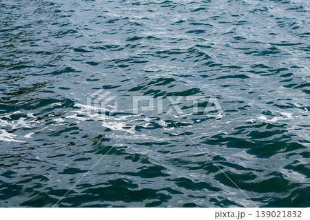Seafoam On Rippling Ocean Waves 139021832