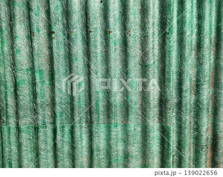Green Corrugated Fiberglass Texture with Weathered Fibers and Industrial Pattern 139022656