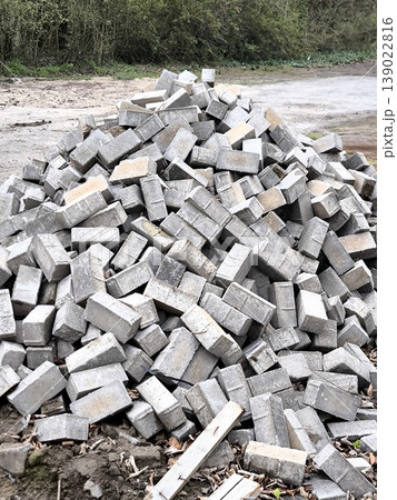 A mountain of concrete paving stones at a construction site A mountain of concrete paving stones at a construction site 139022816