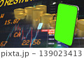 Mobile Trading and Investment Concept with Smartphone Green Screen and Financial Market Background 3d render. 139023413