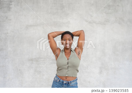 Young woman showing underarm hair with smile body 139023585