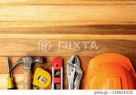 Construction tools on wood table background. Top view with copy space. 139024328