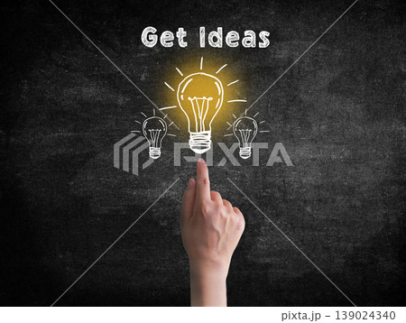 Hand point to light bulb. Creativity concept for good ideas Hand point to light bulb. Creativity concept for good ideas 139024340