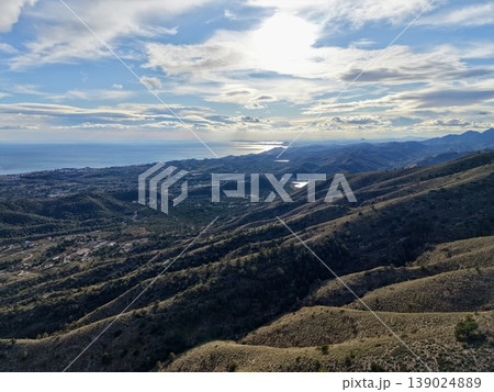 Seaside Landscape Imagery, Scenic Seaside Valley Descending Into Glittering Ocean With Layered Ridges Seaside Landscape Imagery, Scenic Seaside Valley Descending Into Glittering Ocean With Layered Ridges 139024889