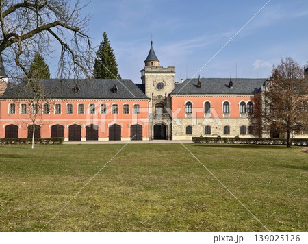 Charming Castle With Central Tower. Grand Estate Featuring Symmetrical Design And Clock Tower 139025126