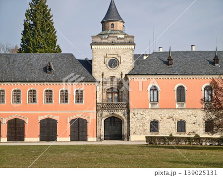 Majestic Gate With Clocktower. Spectacular Gateway Featuring Elaborate Clocktower And Decorative Wings Majestic Gate With Clocktower. Spectacular Gateway Featuring Elaborate Clocktower And Decorative Wings 139025131