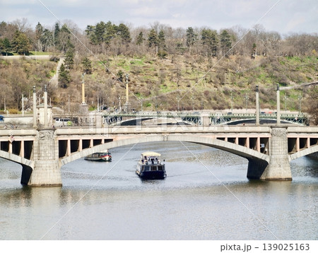 Calm Water Beneath Historic Stone Bridge. Tranquil City Environment With Crossing Trains And Reflected Sky 139025163