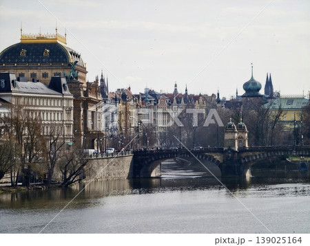 Beautiful Bridge With Statues. Picturesque Riverside View Showcasing Historic Monuments And Reflections 139025164