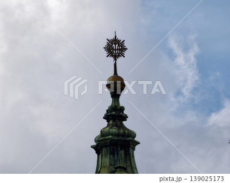 Ornate Metalwork With Patina. Artistic Copper Crowning Piece With Star And Verdigris Details 139025173
