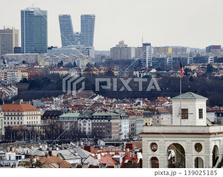 Architectural Scene Showcasing Historic Gate With Modern Urban Development And Layered Rooftops 139025185