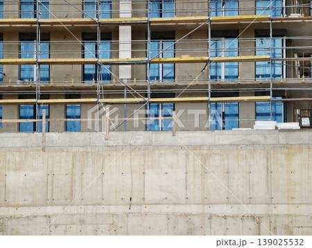 Building Site Elements And Safety Indicators. Structural Groundwork With Raw Textures And Safety Signage Building Site Elements And Safety Indicators. Structural Groundwork With Raw Textures And Safety Signage 139025532