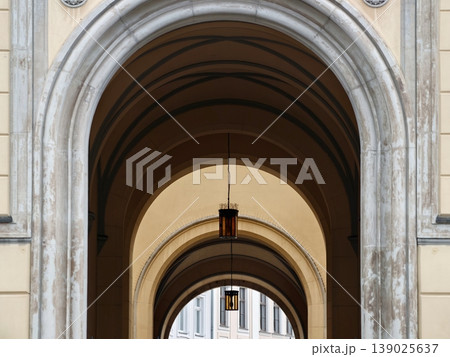 Historic Building With Arched Windows And Intricate Stone Carvings Displaying Craftsmanship 139025637