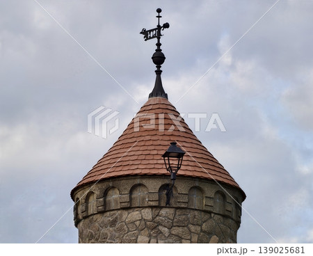 Medieval Tower With Weather Vane. Restorationready Medieval Masonry Featuring Weather Vane And Lamp 139025681