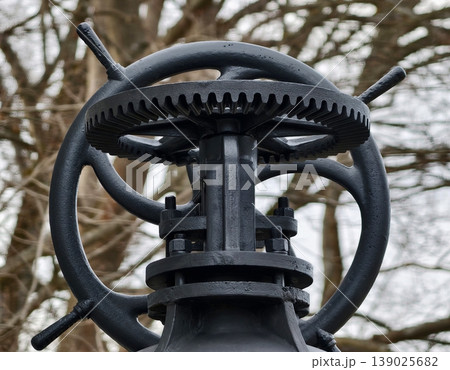 Antiquated Iron Machine Piece Featuring Oxidized Gears And Frosty Winter Environment Background Antiquated Iron Machine Piece Featuring Oxidized Gears And Frosty Winter Environment Background 139025682
