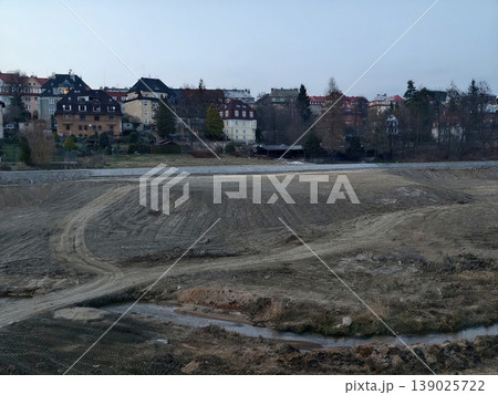 Excavator Modifies Riverbed Before Development. Sediment Removal And Bank Assessment In Progress 139025722