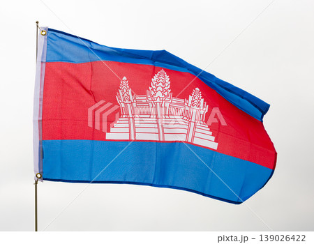National flag of Cambodia waving on flagstaff against sky National flag of Cambodia waving on flagstaff against sky 139026422