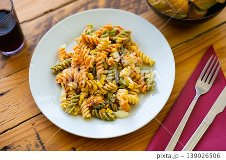 Salad with pasta, seafood, corn and vegetables 139026506