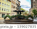 Historic City Fountain with Sculpture and Urban Architecture Daylight Travel Scene 139027835