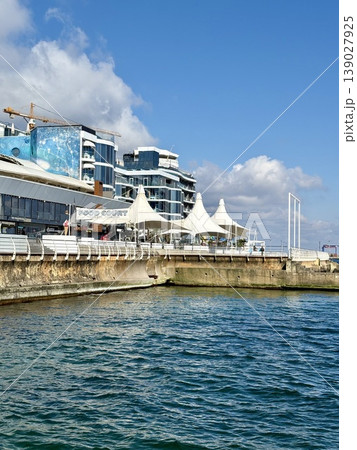 Modern Seaport Architecture and Leisure in Sunny Day Modern Seaport Architecture and Leisure in Sunny Day 139027925