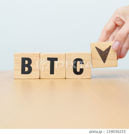 Hand change Wooden block with BTC or Bitcoin text to UP and Down arrow symbol. cryptocurrency, blockchain, price, down and up, decrease and increase, cut loss, trade and financial concepts Hand change Wooden block with BTC or Bitcoin text to UP and Down arrow symbol. cryptocurrency, blockchain, price, down and up, decrease and increase, cut loss, trade and financial concepts 139030255