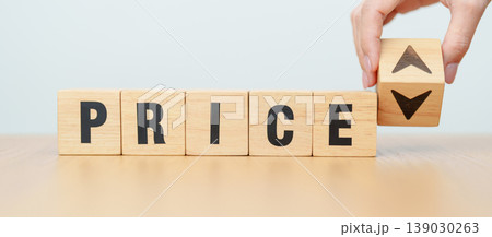 hand change wooden block with PRICE text to UP and Down arrow icon. Sale marketing, Price decrease and Increase Financial, money Value, discount, consumption, investment and purchases concept 139030263