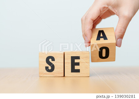 Hand change Wooden block from SEA to SEO. Search Engine Optimization, SEM, Advertising, Marketing, Idea, Strategy, Keyword, Content and technology concept 139030281