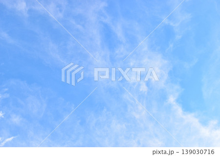 beautiful blue sky and white fluffy group of clouds with sunrise in the morning, natural background beautiful blue sky and white fluffy group of clouds with sunrise in the morning, natural background 139030716