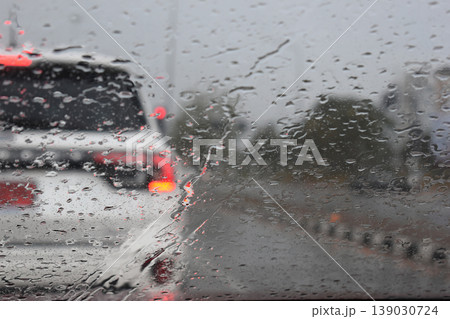 car on highway road with rainny season, blurred image car on highway road with rainny season, blurred image 139030724