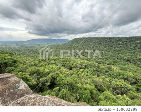 Panoramic View of Lush Green Tropical Forest and Mountains Under Cloudy Sky Panoramic View of Lush Green Tropical Forest and Mountains Under Cloudy Sky 139032299