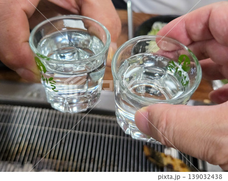 clear korean distilled spirit soju in a small glass clear korean distilled spirit soju in a small glass 139032438