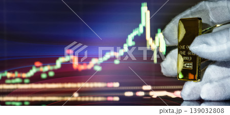 gold bullion with digital stock market quotes in the background. Concept of safe investments. gold bullion with digital stock market quotes in the background. Concept of safe investments. 139032808