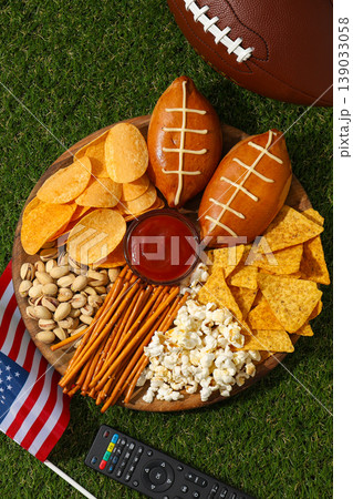 Snacks arranged on a platter with chips, popcorn, and dip Snacks arranged on a platter with chips, popcorn, and dip 139033058