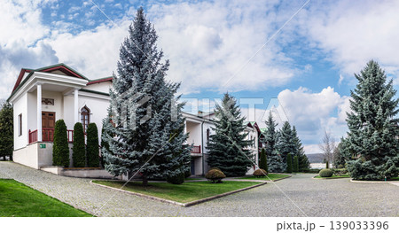 Panoramic View of Monastery Buildings and Spruce Trees in Curchi Panoramic View of Monastery Buildings and Spruce Trees in Curchi 139033396