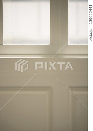 Natural Sunlight and Leaf Shadows on Window and Wooden Floor Background. Natural Sunlight and Leaf Shadows on Window and Wooden Floor Background. 139033441
