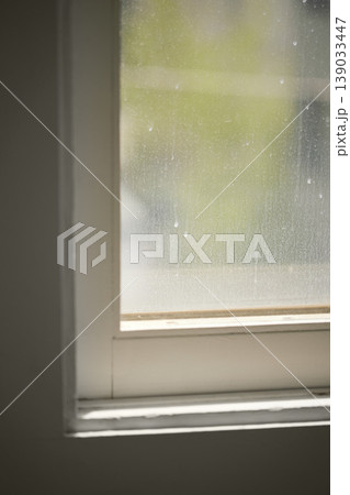 Natural Sunlight and Leaf Shadows on Window and Wooden Floor Background. Natural Sunlight and Leaf Shadows on Window and Wooden Floor Background. 139033447