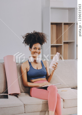 Women exercising in fitness studio yoga classes 139033563