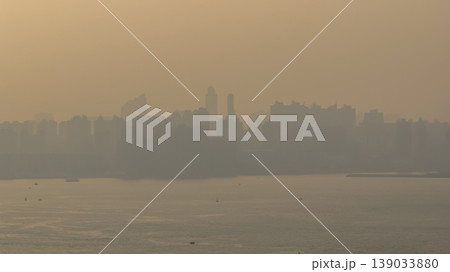 April 18 2026 Hung Hom Harbourfront Skyline In Golden Haze 139033880