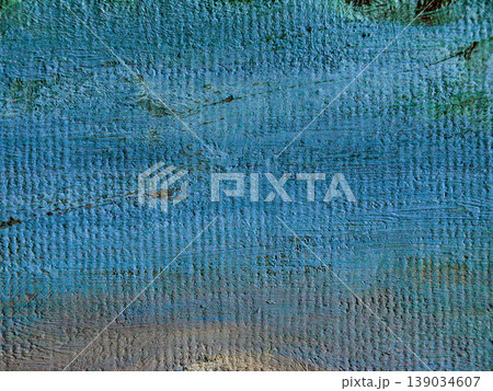 Blue oil painting background with visible canvas texture. Abstract monochrome composition featuring azure and cobalt pigments with a detailed fiber grain and nuanced chromatic transitions. 139034607