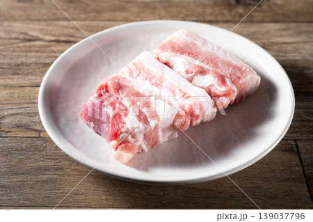 raw pork in white plate raw pork in white plate 139037796