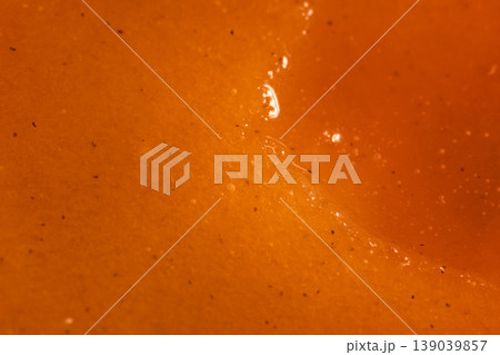High quality shot capturing juicy apricot surface and textures. Photograph emphasizing glistening juice and porous texture of freshly picked apricot 139039857