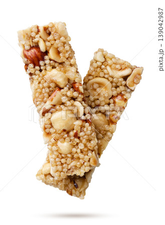 Cereal bars flying close-up on a white. Isolated Cereal bars flying close-up on a white. Isolated 139042987
