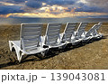 sun loungers for relaxing on the beach on a sunny day 139043081