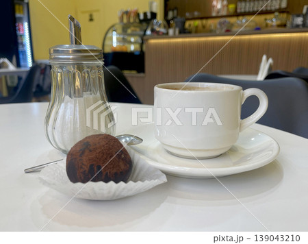 coffee and sweets on the table in a cafe 139043210