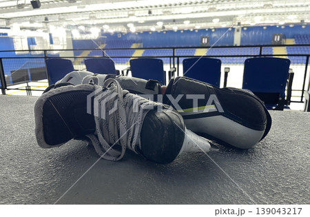 hockey arm guard and skate on the ice stadium floor 139043217