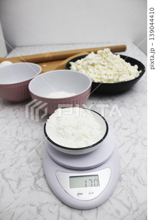 Weighing of products, sugar, flour for cake Weighing of products, sugar, flour for cake 139044410