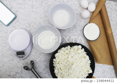 Preparing products for making a cake pie Preparing products for making a cake pie 139044412