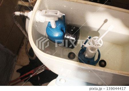 Close-up toilet tank trigger. toilet 139044417