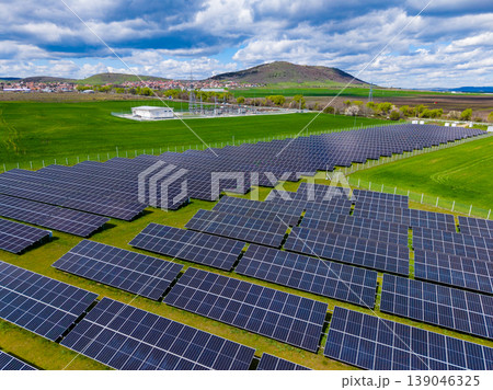 Solar energy farm in a rural area with multiple solar panels under a blue sky during daytime Solar energy farm in a rural area with multiple solar panels under a blue sky during daytime 139046325